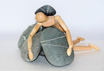 figur_mit_steinen